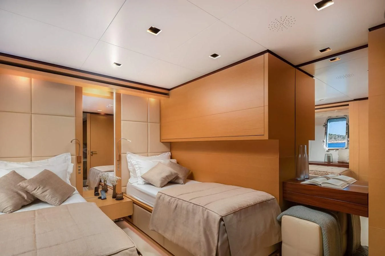 a room with a bed and a tv aboard LAMMOUCHE Yacht for Sale