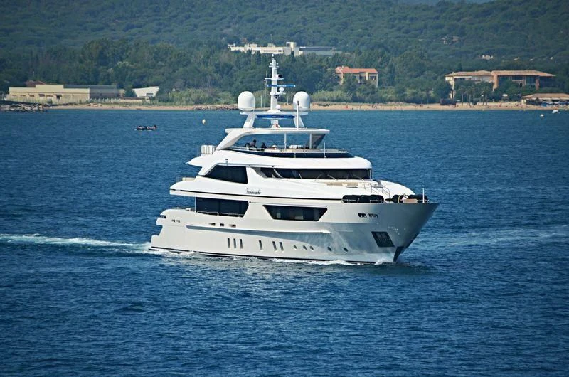 a white yacht on the water aboard LAMMOUCHE Yacht for Sale