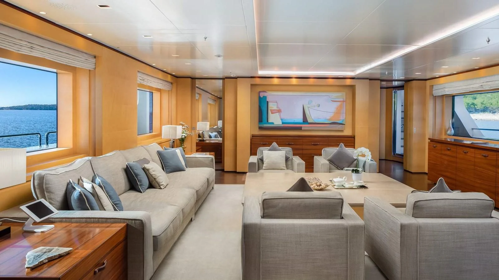 a living room with a couch and a tv aboard LAMMOUCHE Yacht for Sale