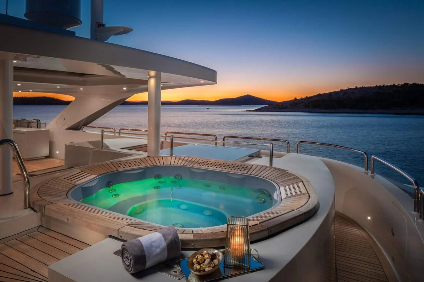 a large swimming pool on a boat aboard LAMMOUCHE Yacht for Sale