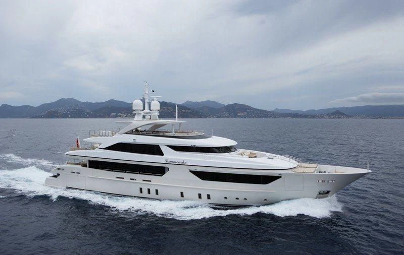 a white yacht on the water aboard LAMMOUCHE Yacht for Sale