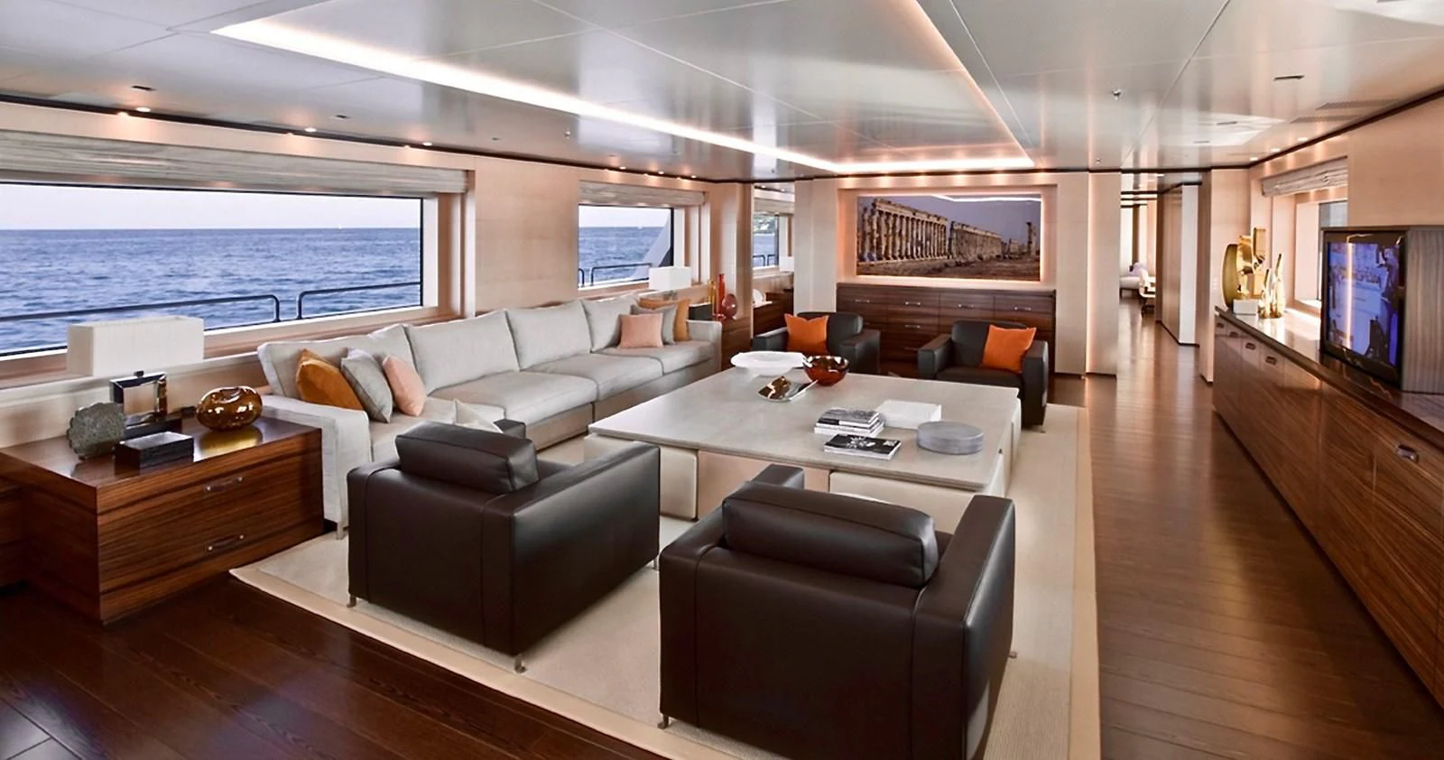 a living room with a large window aboard LAMMOUCHE Yacht for Sale
