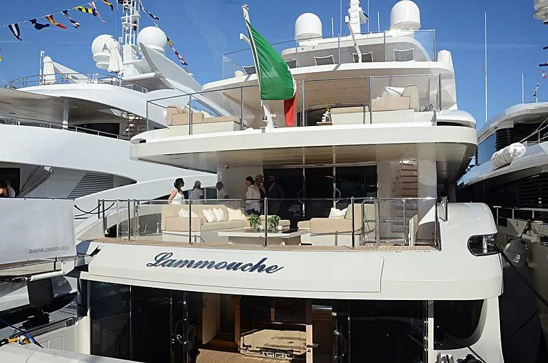a large white boat with people on it aboard LAMMOUCHE Yacht for Sale