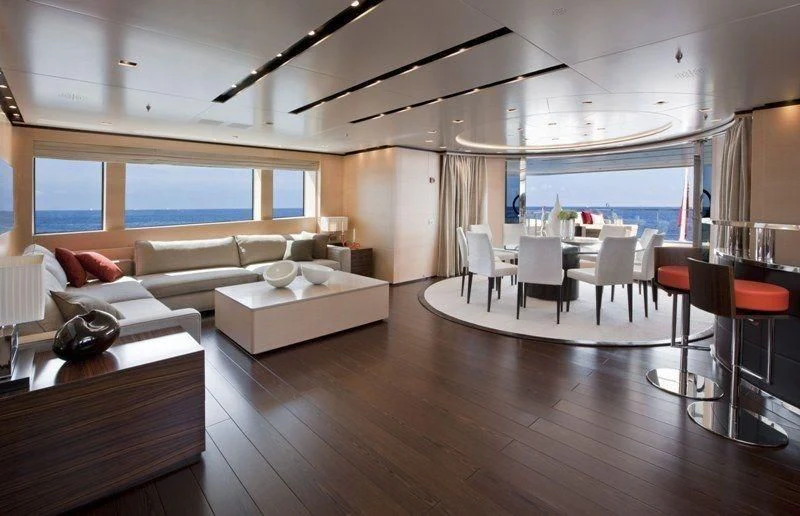 a living room with a large window aboard LAMMOUCHE Yacht for Sale