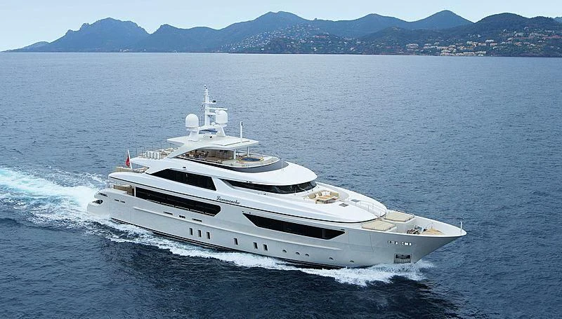 a white yacht on the water aboard LAMMOUCHE Yacht for Sale