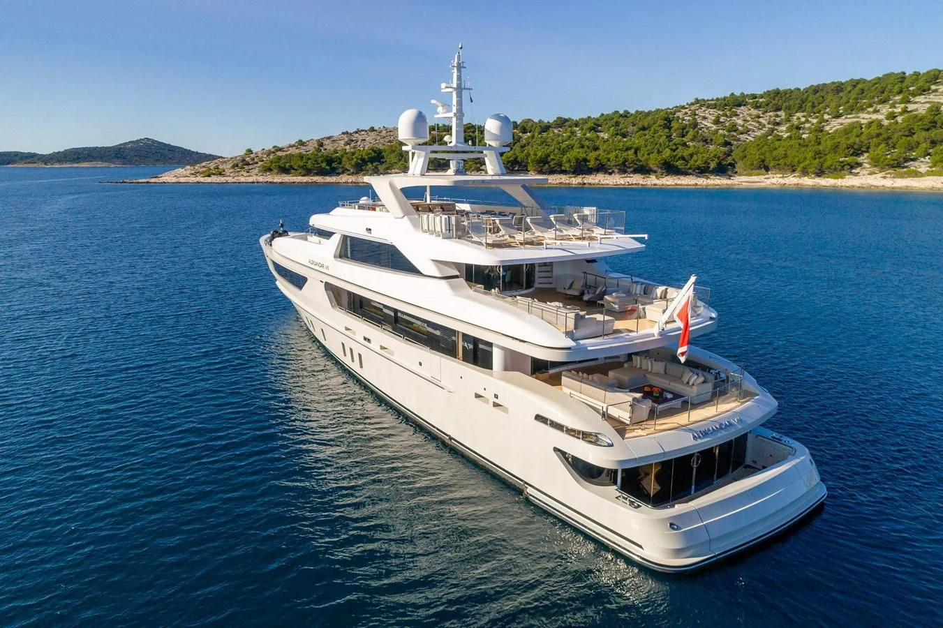 a white yacht in the water aboard LAMMOUCHE Yacht for Sale