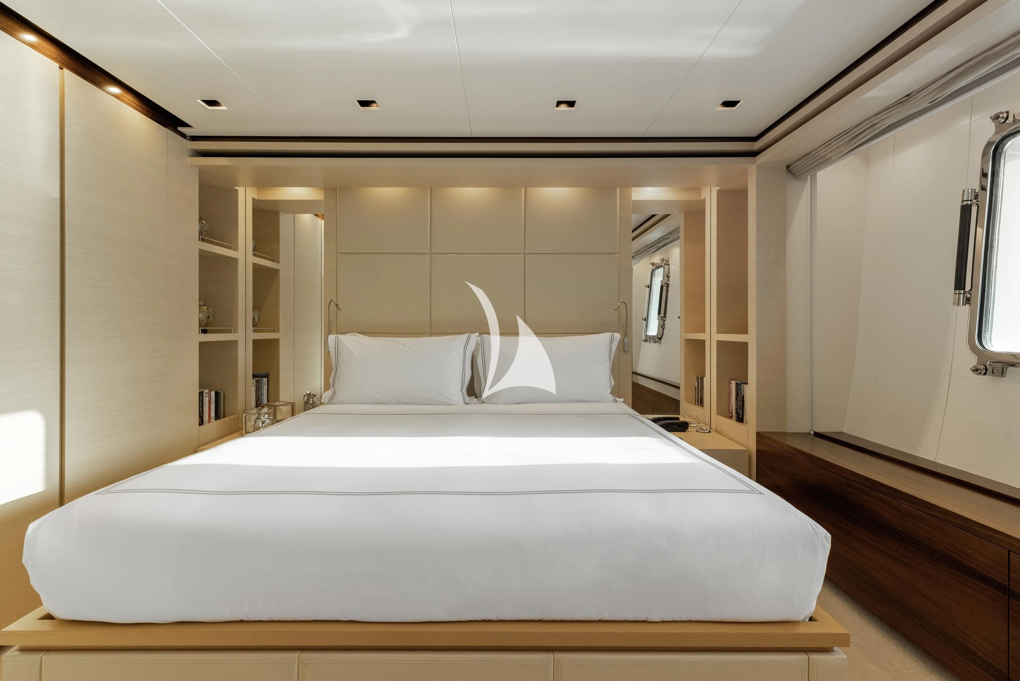a large bed in a room aboard LAMMOUCHE Yacht for Sale