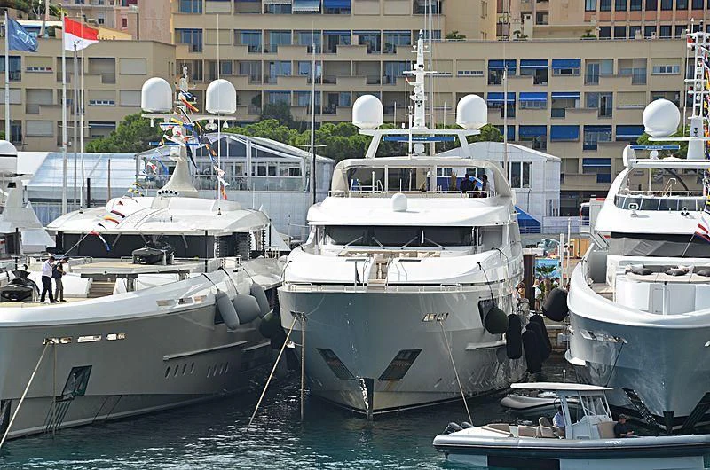 several boats are parked in a harbor aboard LAMMOUCHE Yacht for Sale