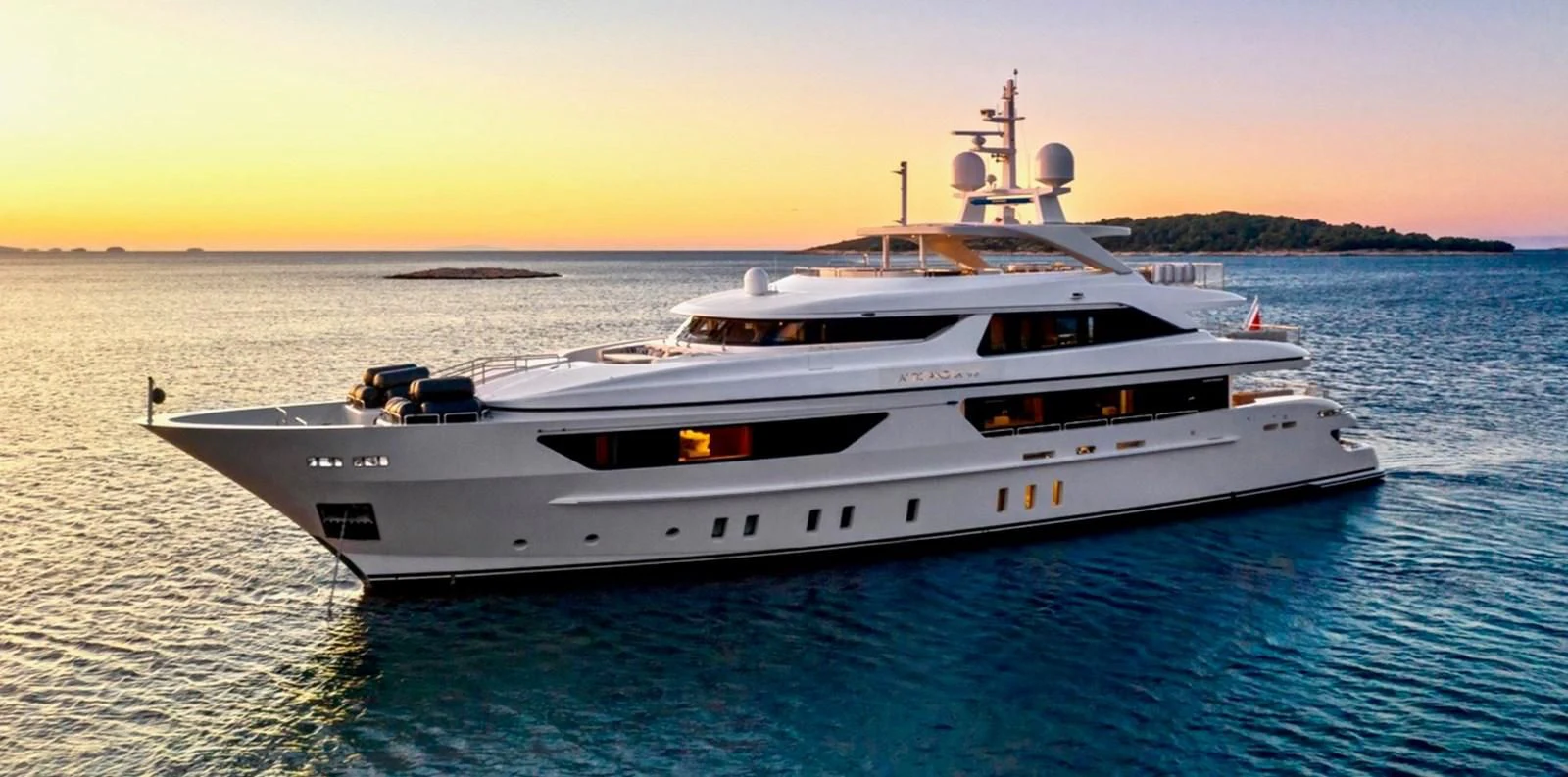 a white yacht on the water aboard LAMMOUCHE Yacht for Sale