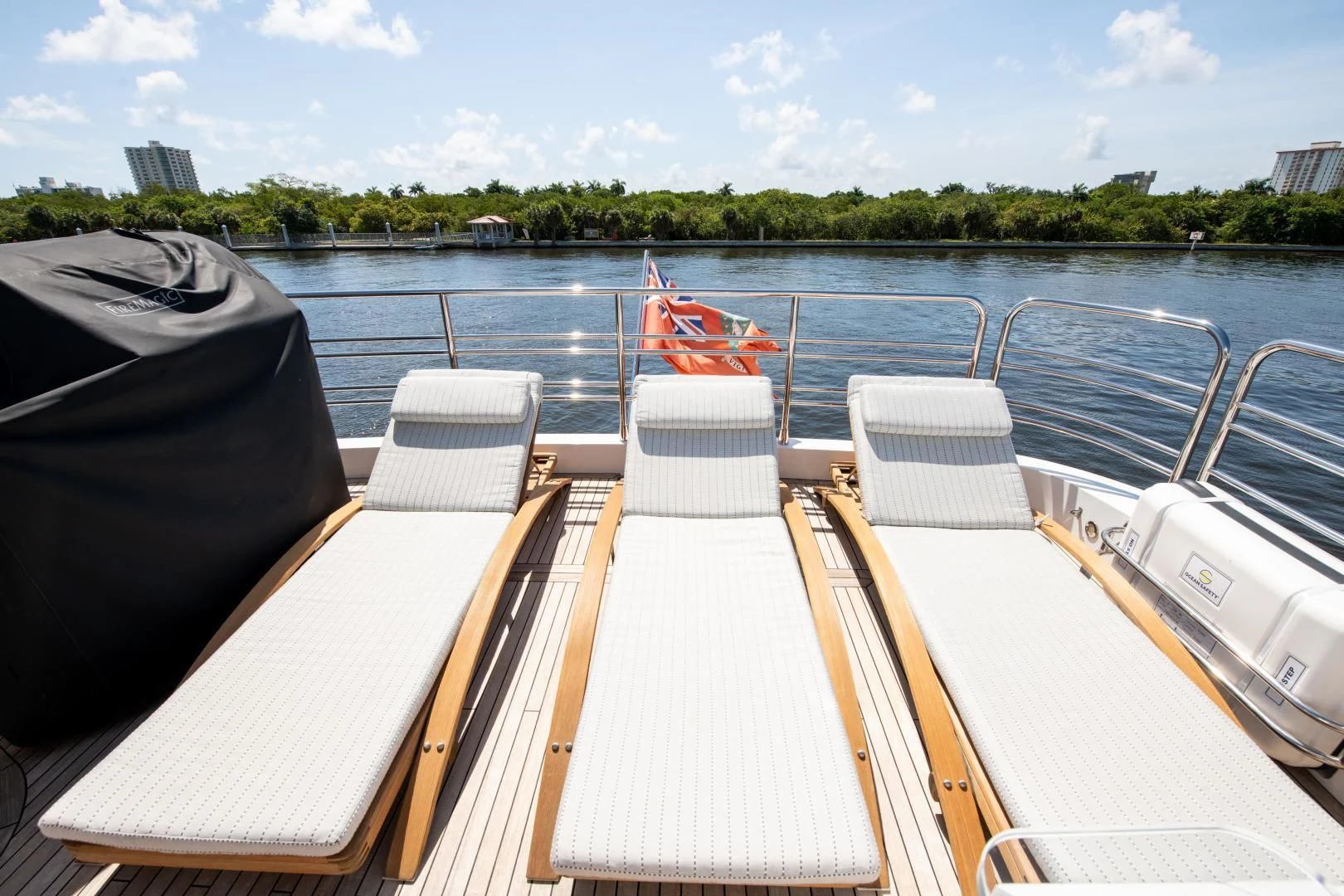 a boat with chairs on it aboard FUNSEEKER Yacht for Sale