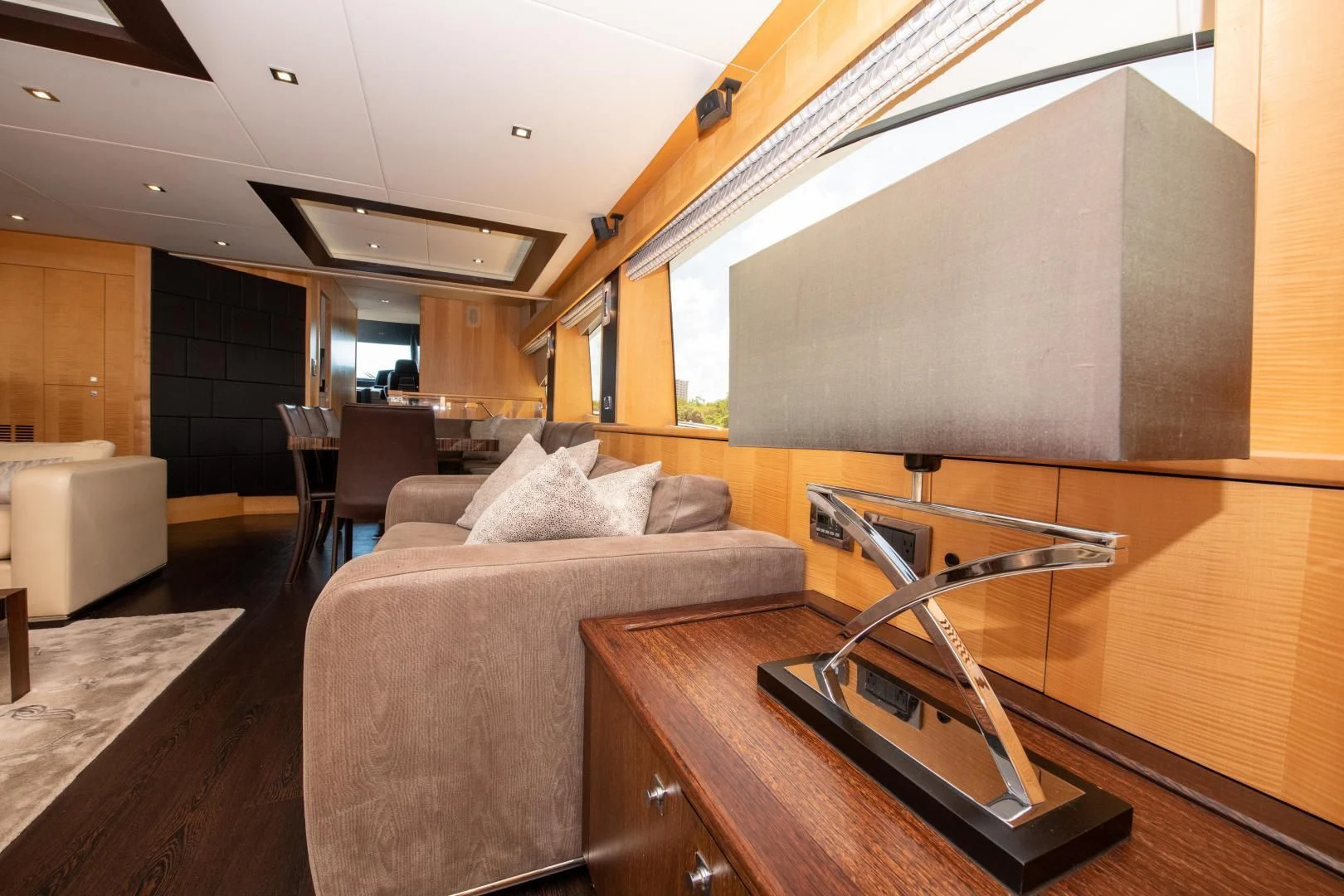 a living room with a large screen aboard FUNSEEKER Yacht for Sale