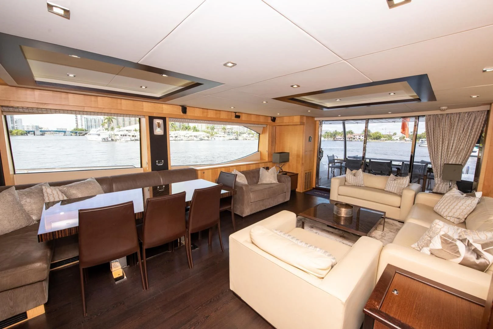 a living room with a large window aboard FUNSEEKER Yacht for Sale