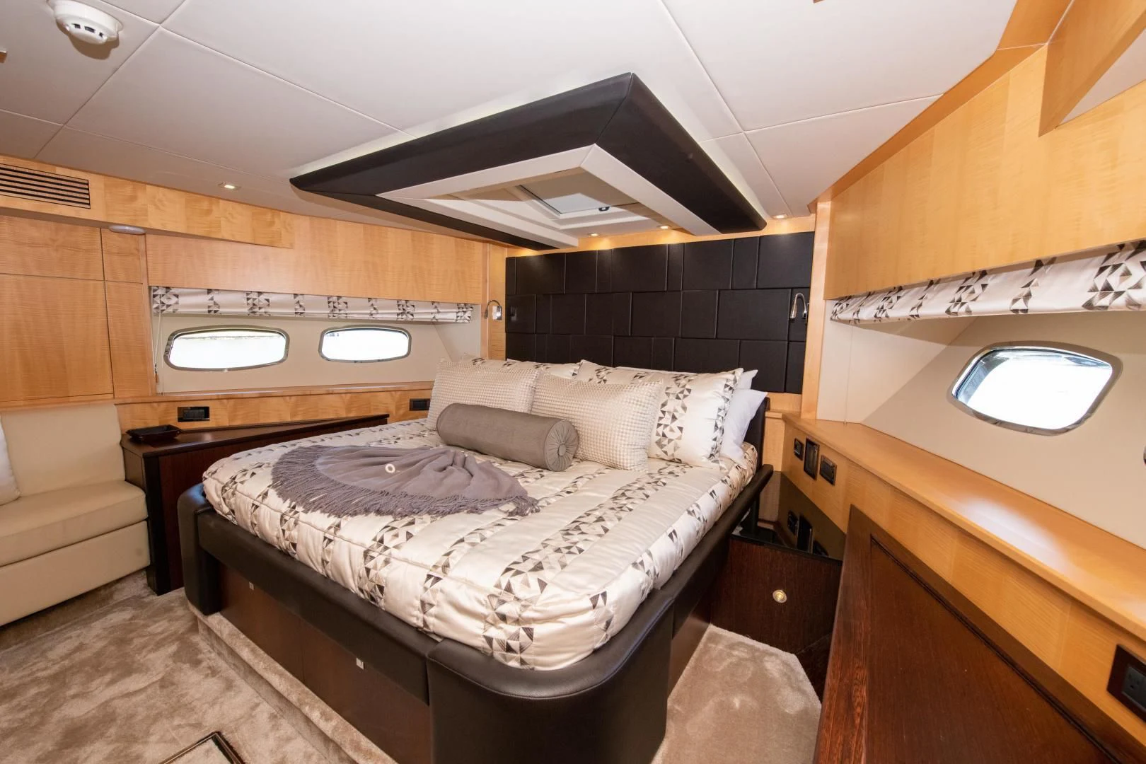 a room with a bed and a window aboard FUNSEEKER Yacht for Sale