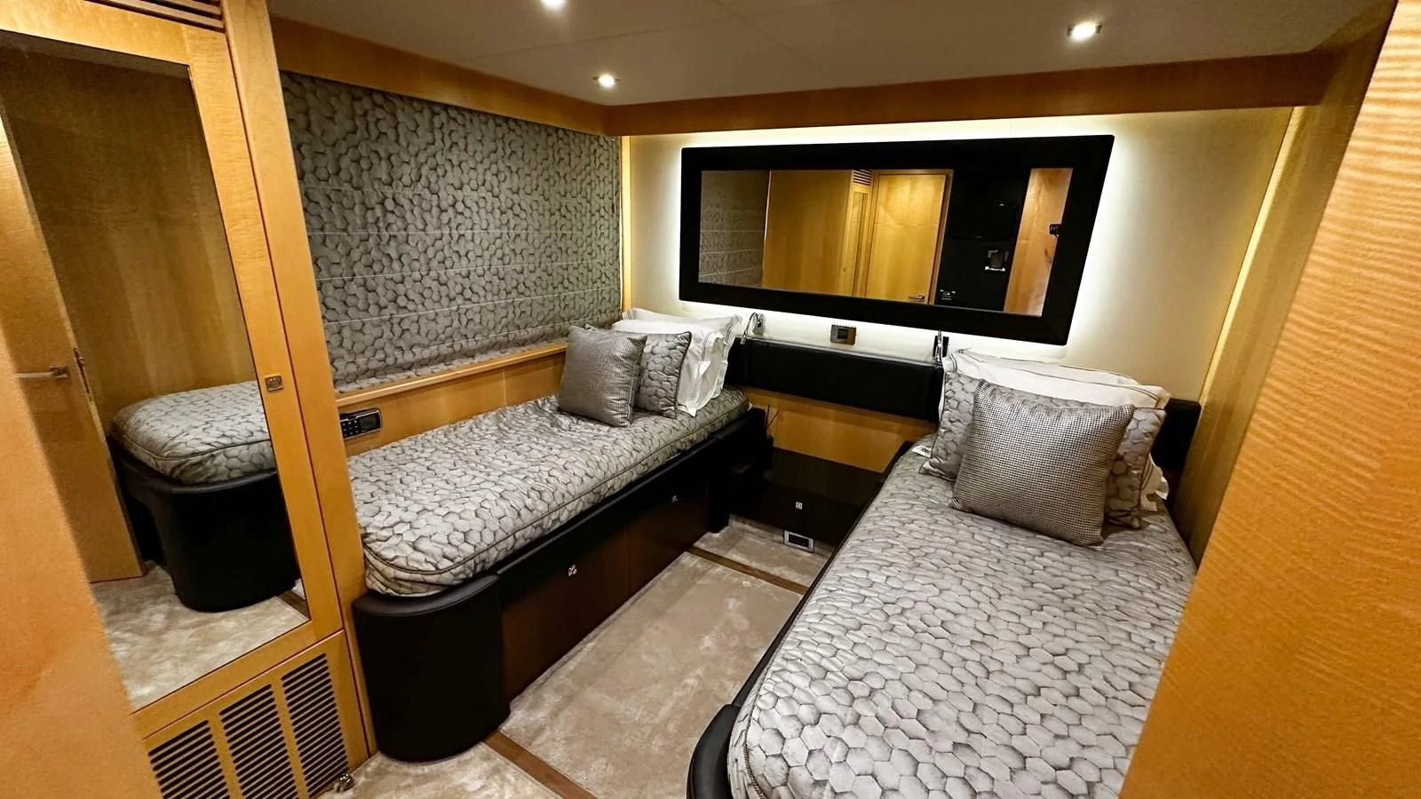 a hotel room with a bed and a tv aboard FUNSEEKER Yacht for Sale