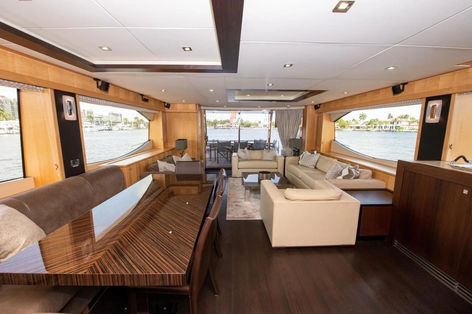 a living room with a large window aboard FUNSEEKER Yacht for Sale
