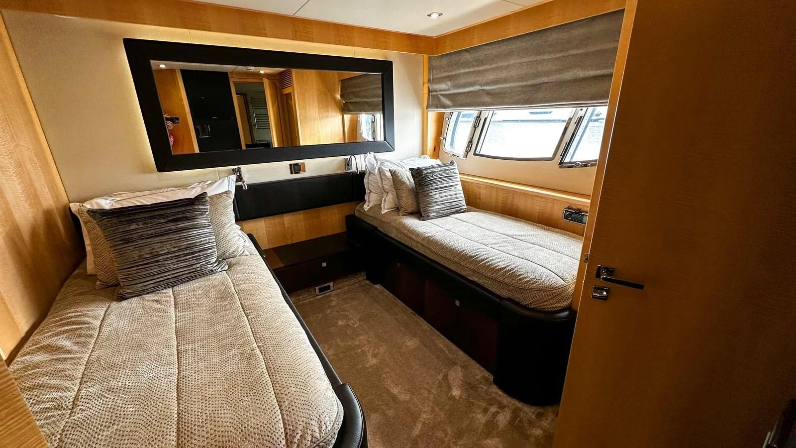a room with two beds aboard FUNSEEKER Yacht for Sale