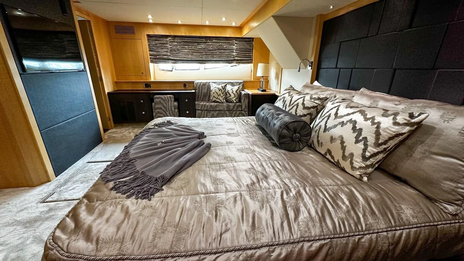 a bed with pillows on it aboard FUNSEEKER Yacht for Sale