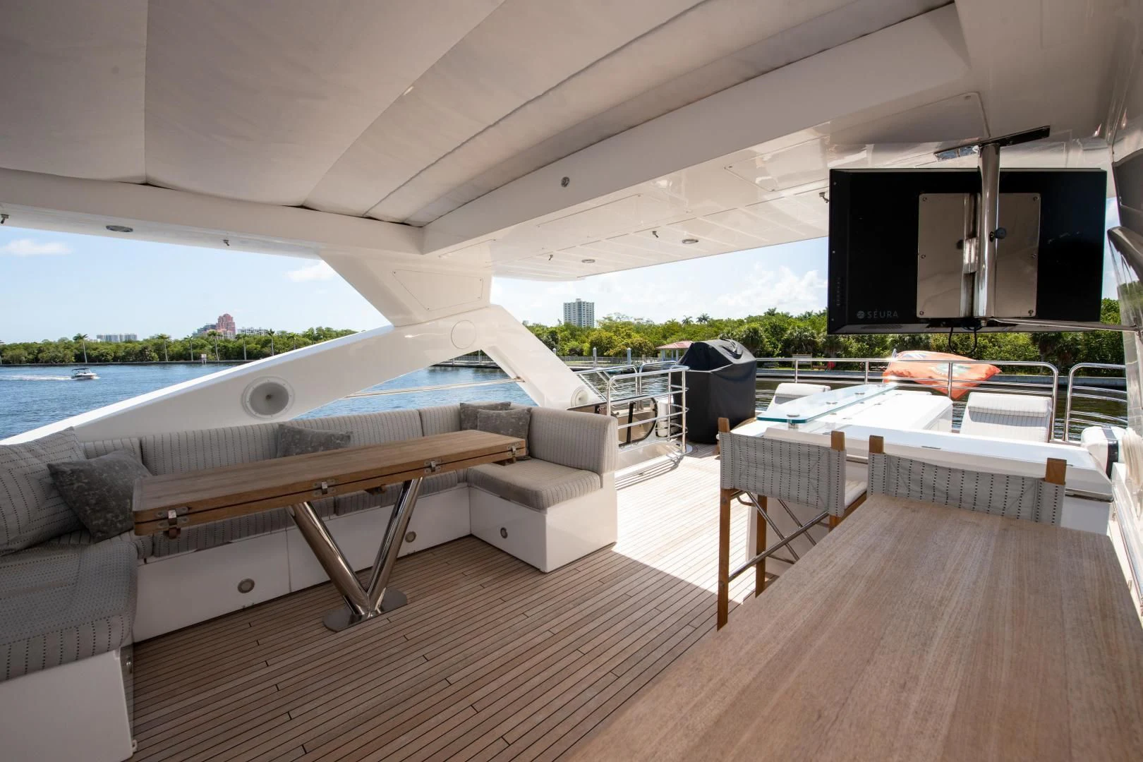 a living room with a pool aboard FUNSEEKER Yacht for Sale