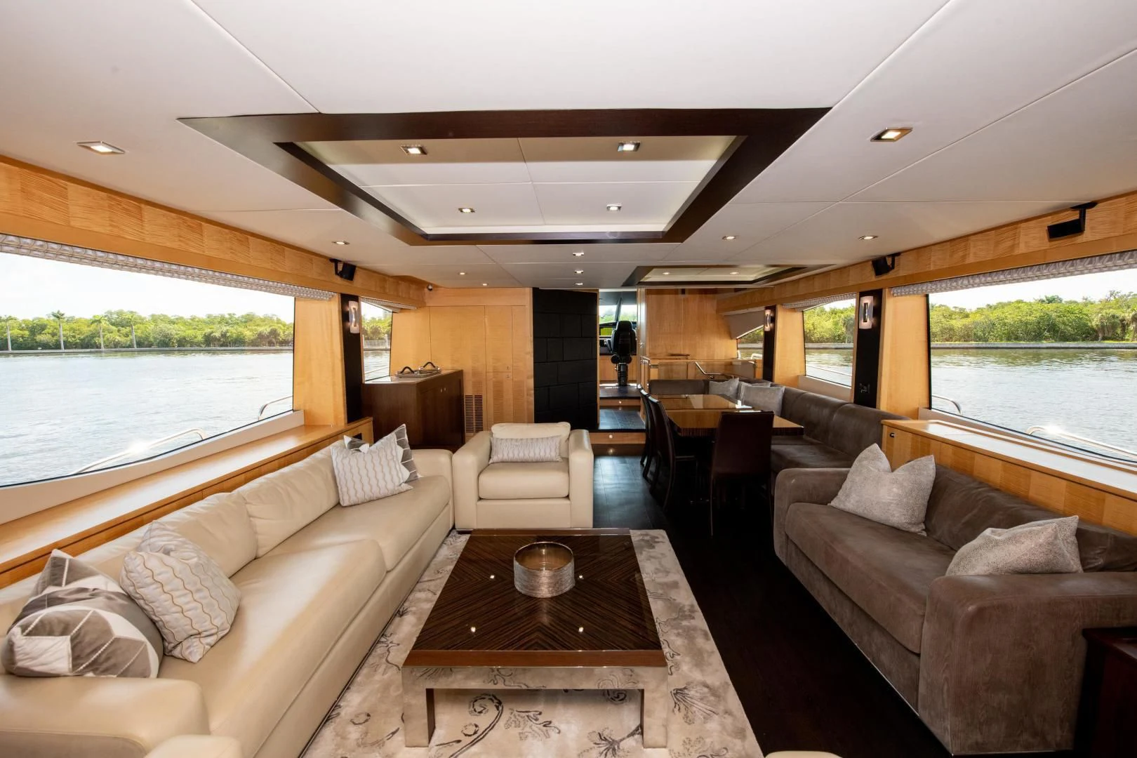 a living room with a large window aboard FUNSEEKER Yacht for Sale
