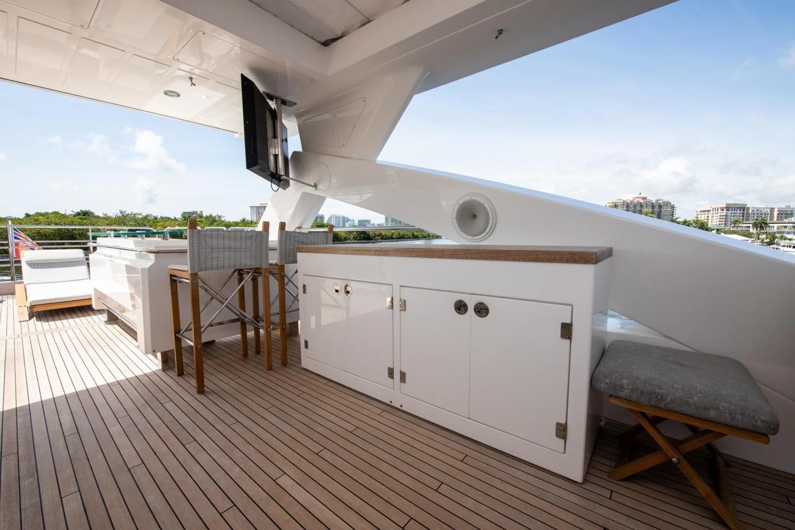 a white kitchen with a large window aboard FUNSEEKER Yacht for Sale