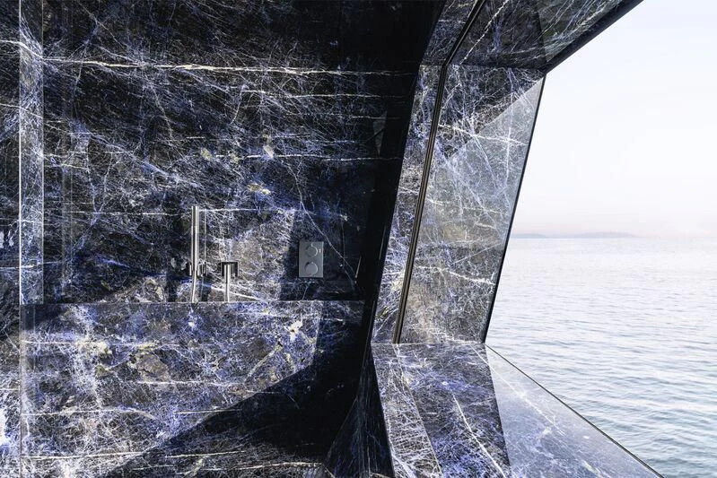 a view of a city from a window of a snowy mountain aboard REGINA D'ITALIA Yacht for Sale