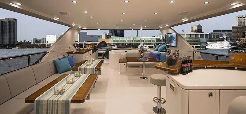 a large room with a large window and a view of a city aboard CRYSTAL ANNE Yacht for Sale