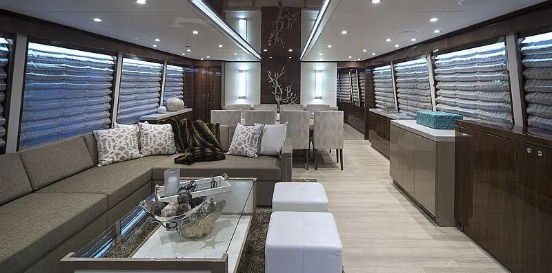 a large living room with a large window aboard CRYSTAL ANNE Yacht for Sale