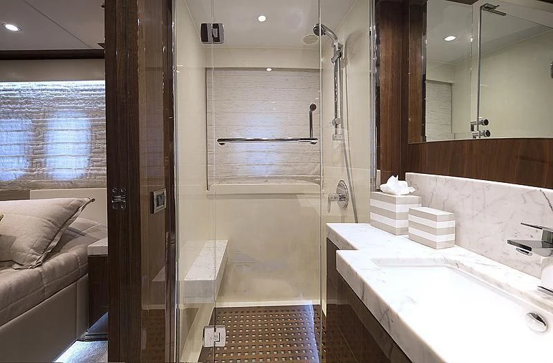 a bathroom with a glass shower aboard CRYSTAL ANNE Yacht for Sale