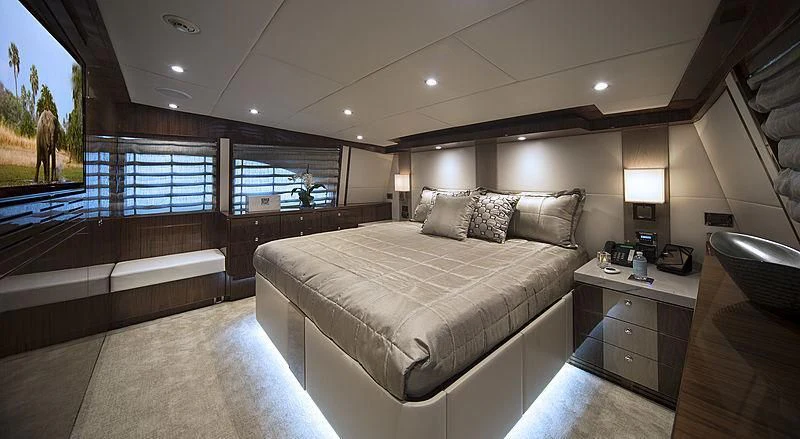 a room with a bed and a window aboard CRYSTAL ANNE Yacht for Sale