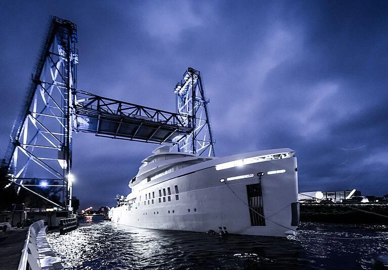 a large white boat in the water aboard SHINKAI Yacht for Sale