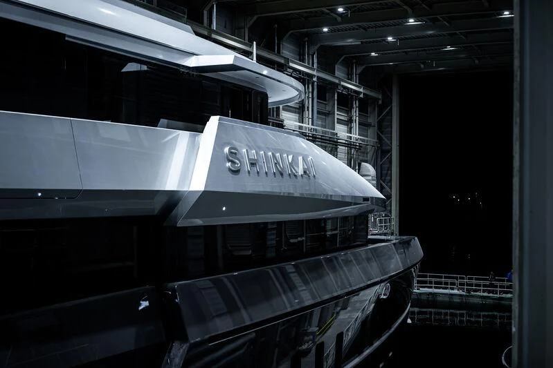 a large space shuttle in a building aboard SHINKAI Yacht for Sale