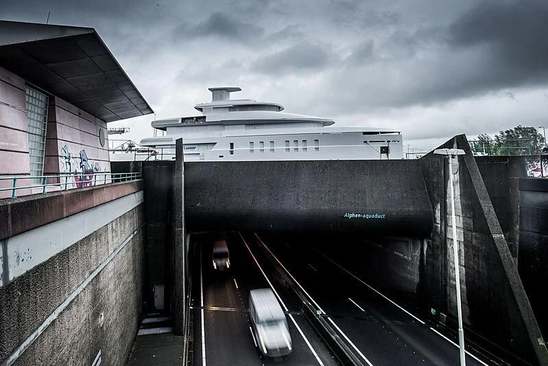 a large cruise ship docked aboard SHINKAI Yacht for Sale
