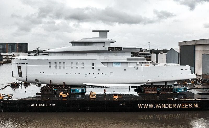 a large ship in a harbor aboard SHINKAI Yacht for Sale