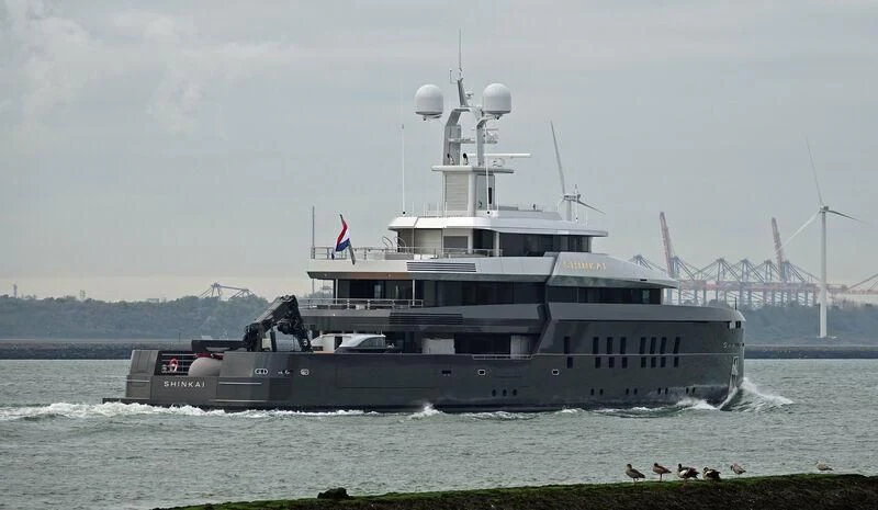 a large boat in the water aboard SHINKAI Yacht for Sale