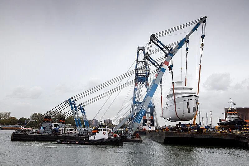 a crane lifting a boat aboard SHINKAI Yacht for Sale