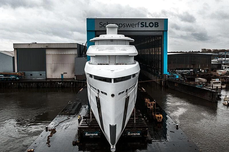 a white and blue container on a dock aboard SHINKAI Yacht for Sale
