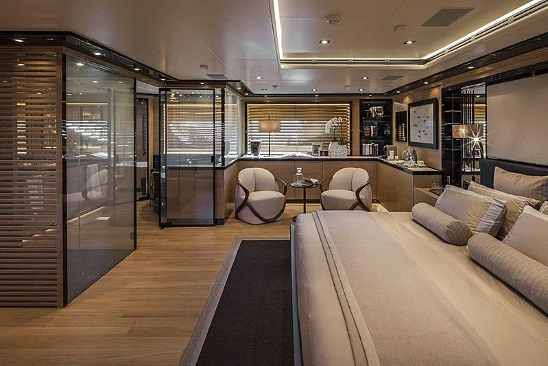 a room with a couch and a table and chairs aboard ALASKA Yacht for Sale
