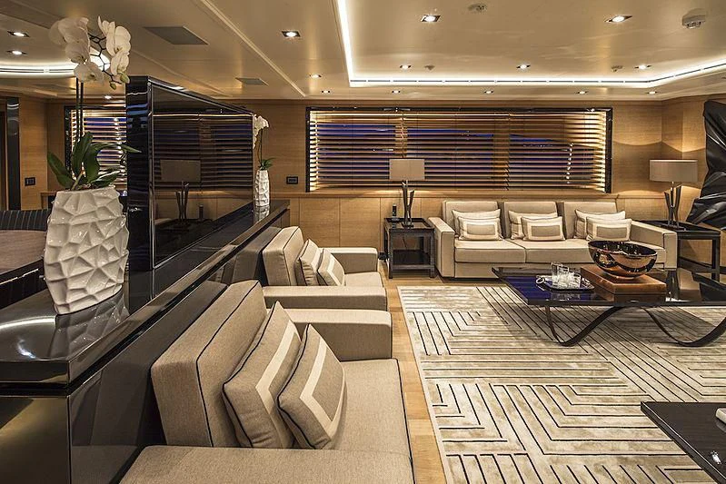 a large living room with a large window aboard ALASKA Yacht for Sale