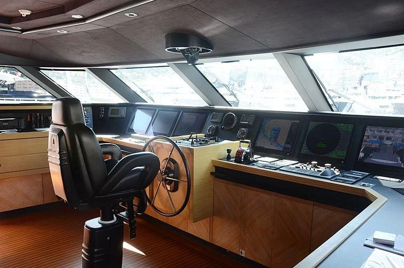 a control room with many monitors aboard ALASKA Yacht for Sale