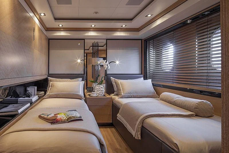 a room with two beds aboard ALASKA Yacht for Sale