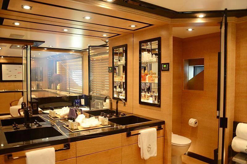 a bathroom with a large mirror aboard ALASKA Yacht for Sale
