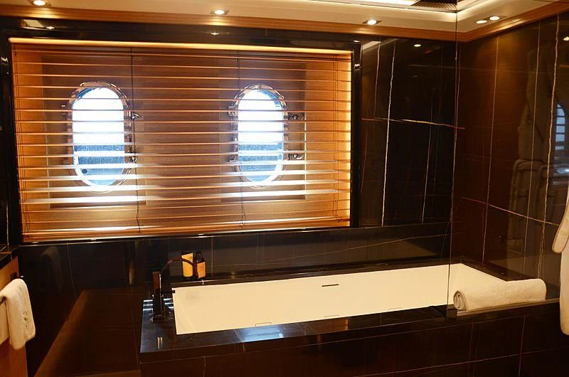 a bathroom with a large window aboard ALASKA Yacht for Sale