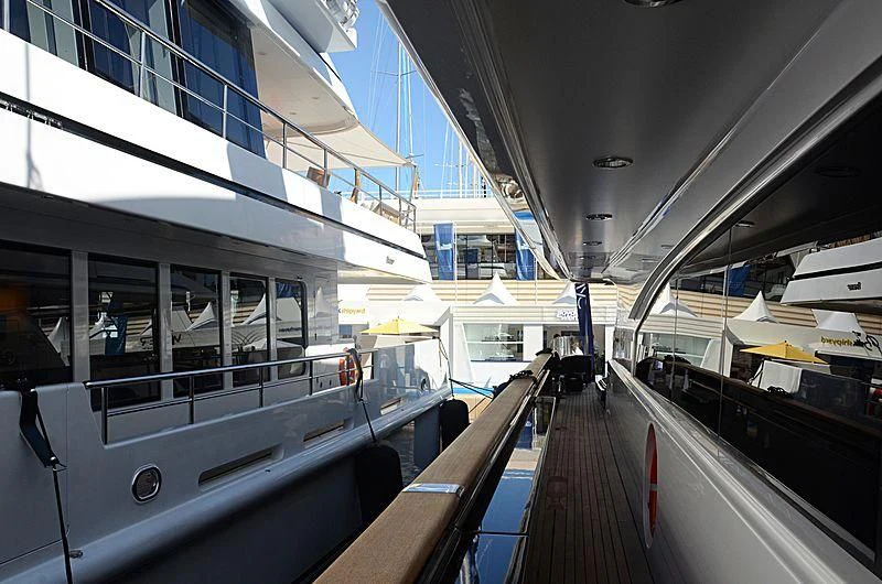a train station with a row of windows and a walkway aboard ALASKA Yacht for Sale