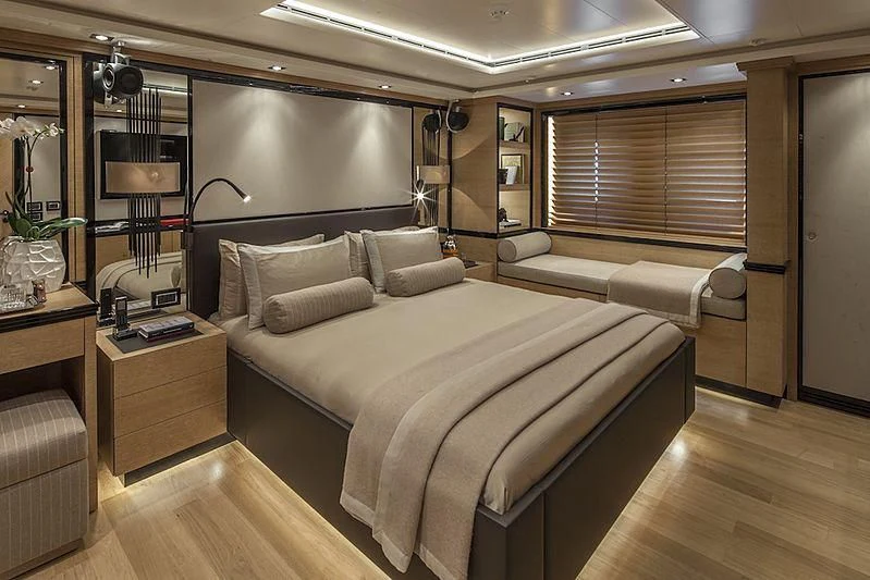 a large bed in a room aboard ALASKA Yacht for Sale