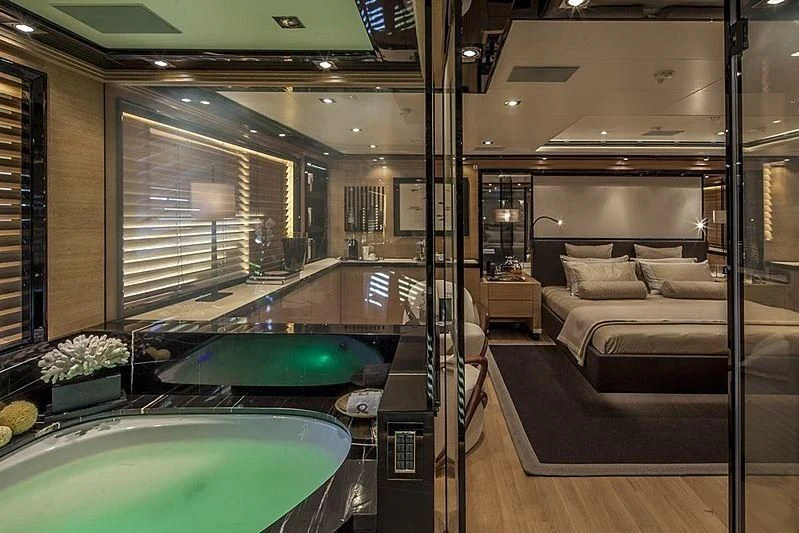 a large bathroom with a tub aboard ALASKA Yacht for Sale