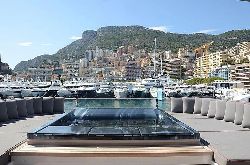 a marina with boats and buildings aboard ALASKA Yacht for Sale
