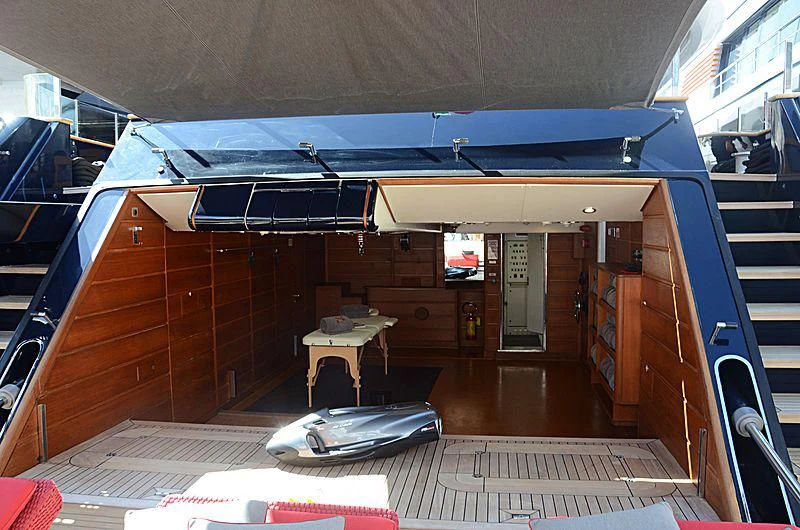 a boat with a table and a laptop on it aboard ALASKA Yacht for Sale