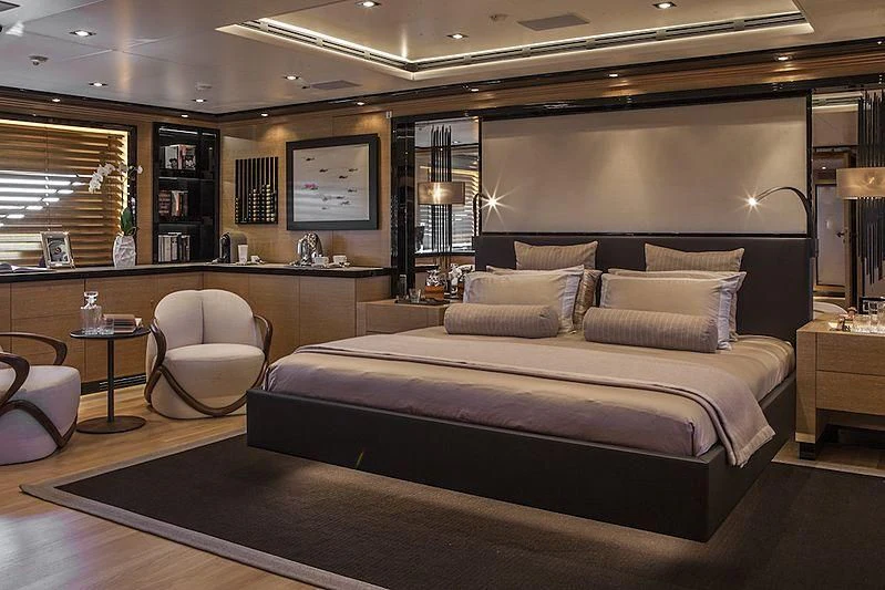 a large bed in a room aboard ALASKA Yacht for Sale