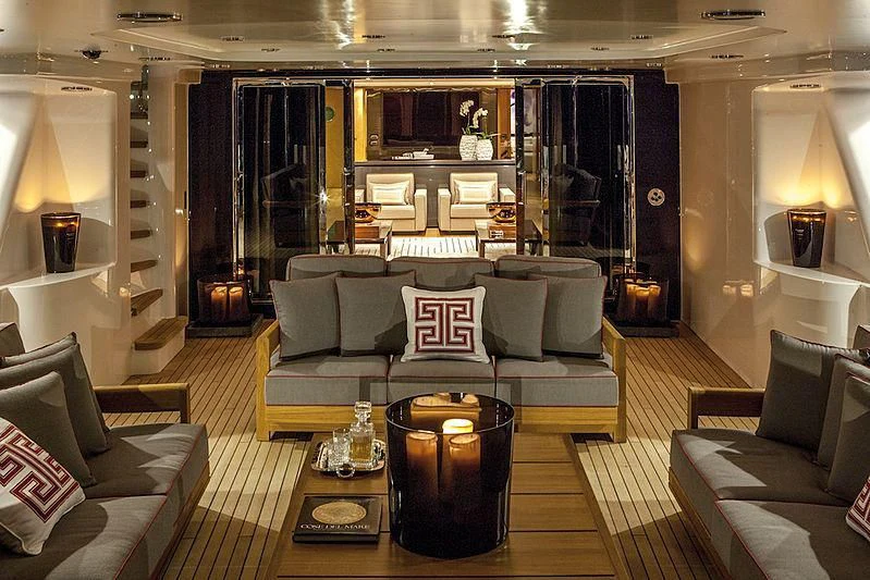a living room with a large mirror aboard ALASKA Yacht for Sale