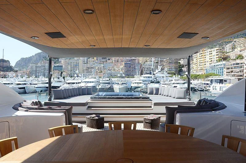 a room with tables and chairs aboard ALASKA Yacht for Sale